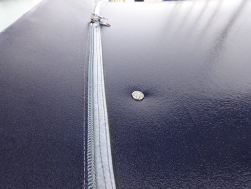 Button magnet securing light