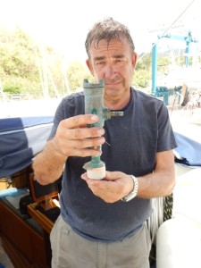 Upright, bubbles collect in top