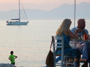 Dinner in a Taverna ashore with Hejira anchored in the background